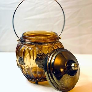 Fancy glass lantern with metal leaves and a music box top